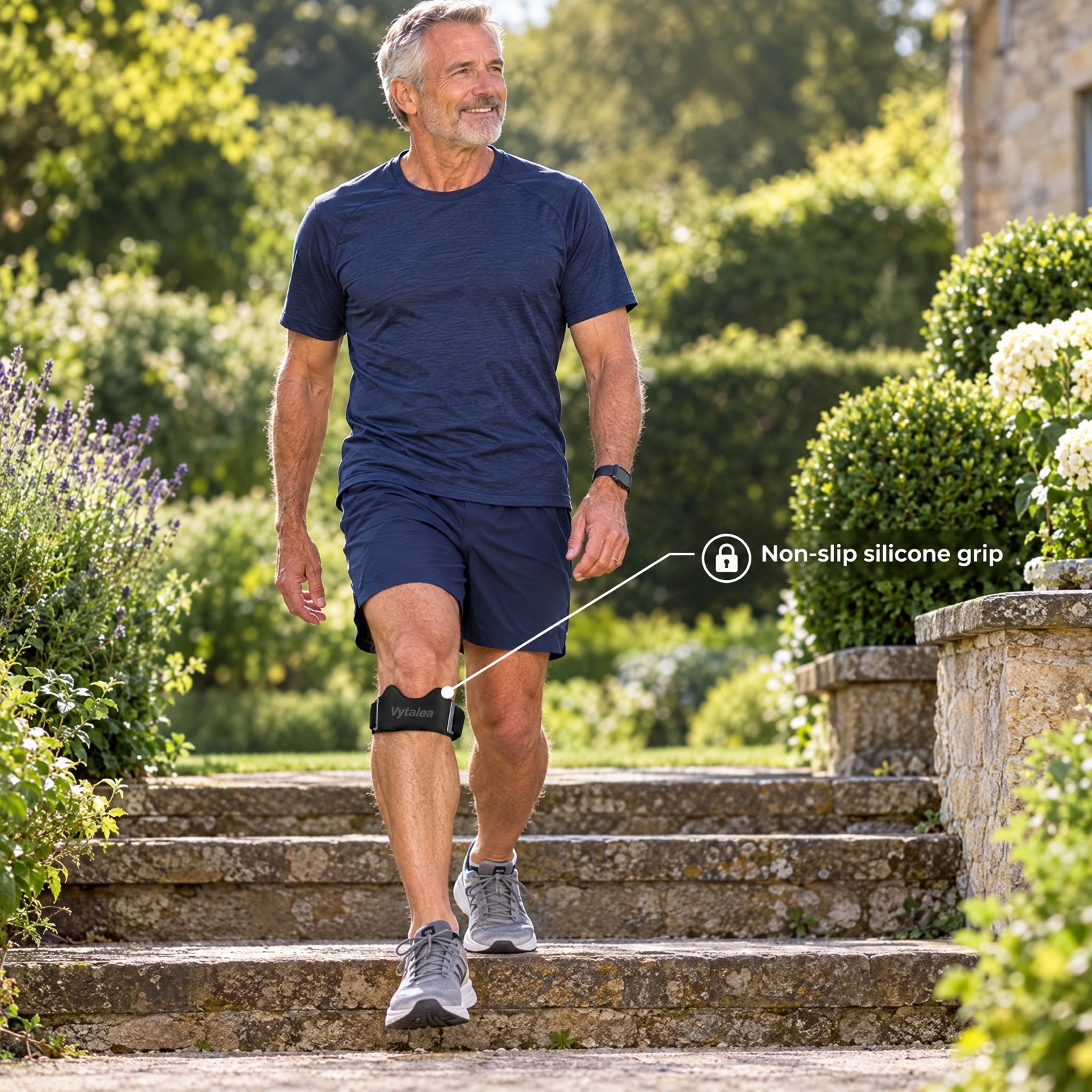 Man walking down garden steps wearing Vytalea